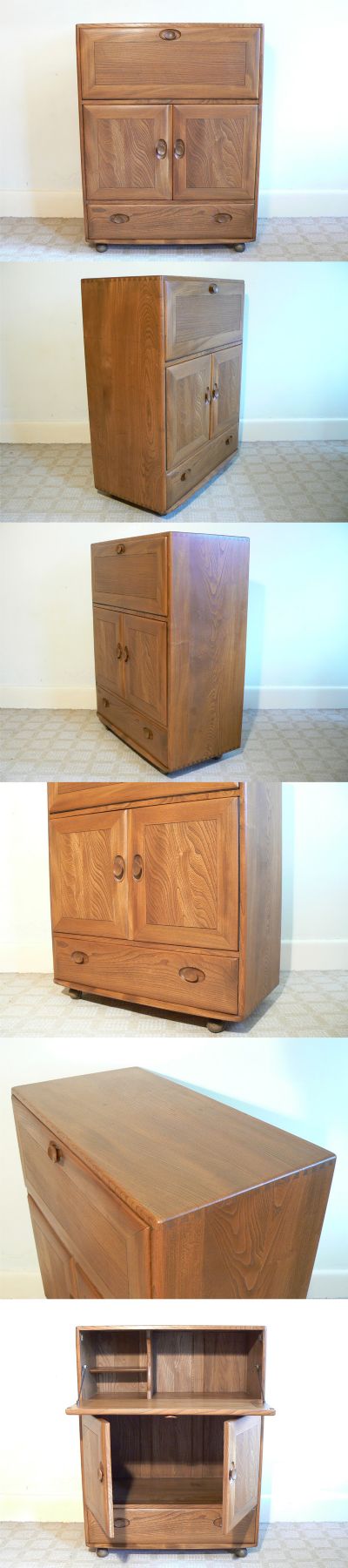 An Ercol serving cabinet/bureau, c1960s. Solid elm with excellent figured grain, would make an ideal writing/computer desk.