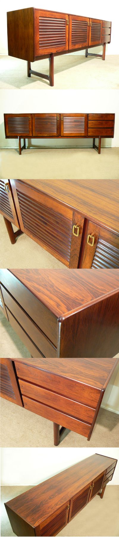 A large rosewood sideboard with a superb grain. Manufactured by Mcintosh of Scotland, c1970s.