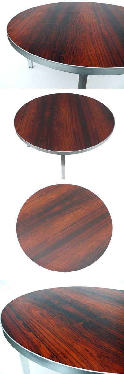 A rosewood coffee table, c1970s standing on an aluminium base